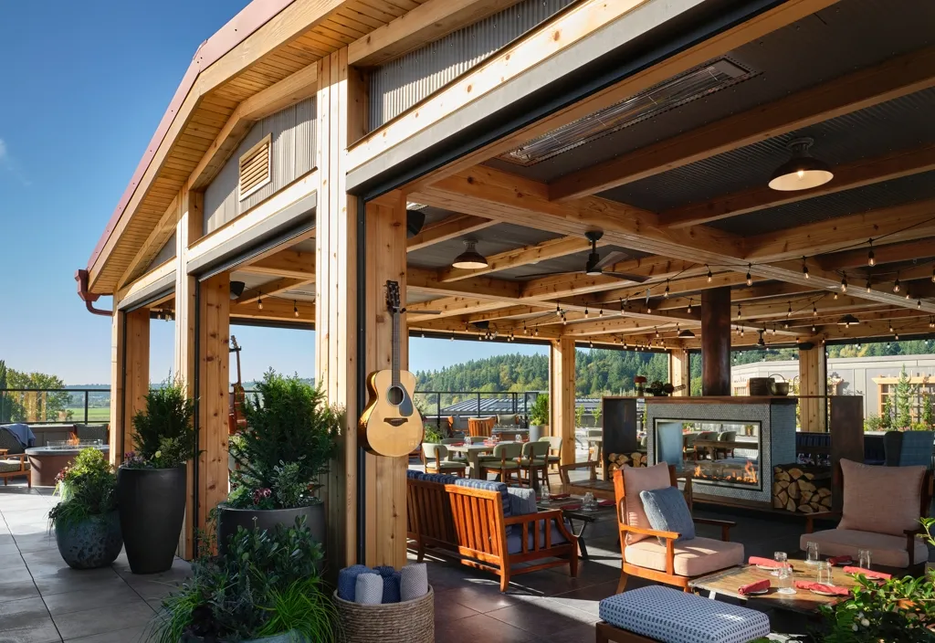 The Shed rooftop patio with guitars on the timber columns and lounge seating